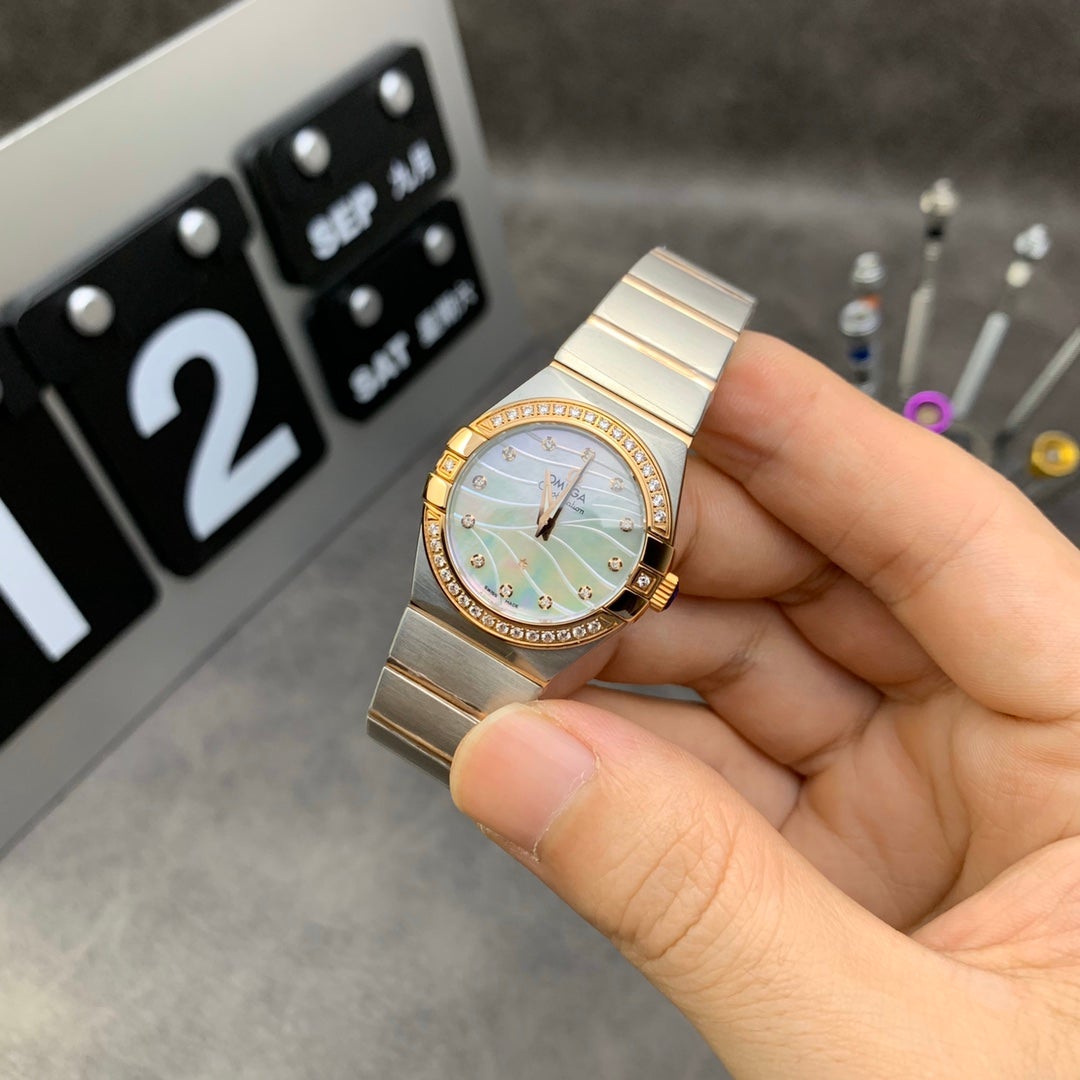CONSTELLATION LADIES 27MM QUARTZ DIAMOND BEZEL MOTHER OF PEARL DIAL