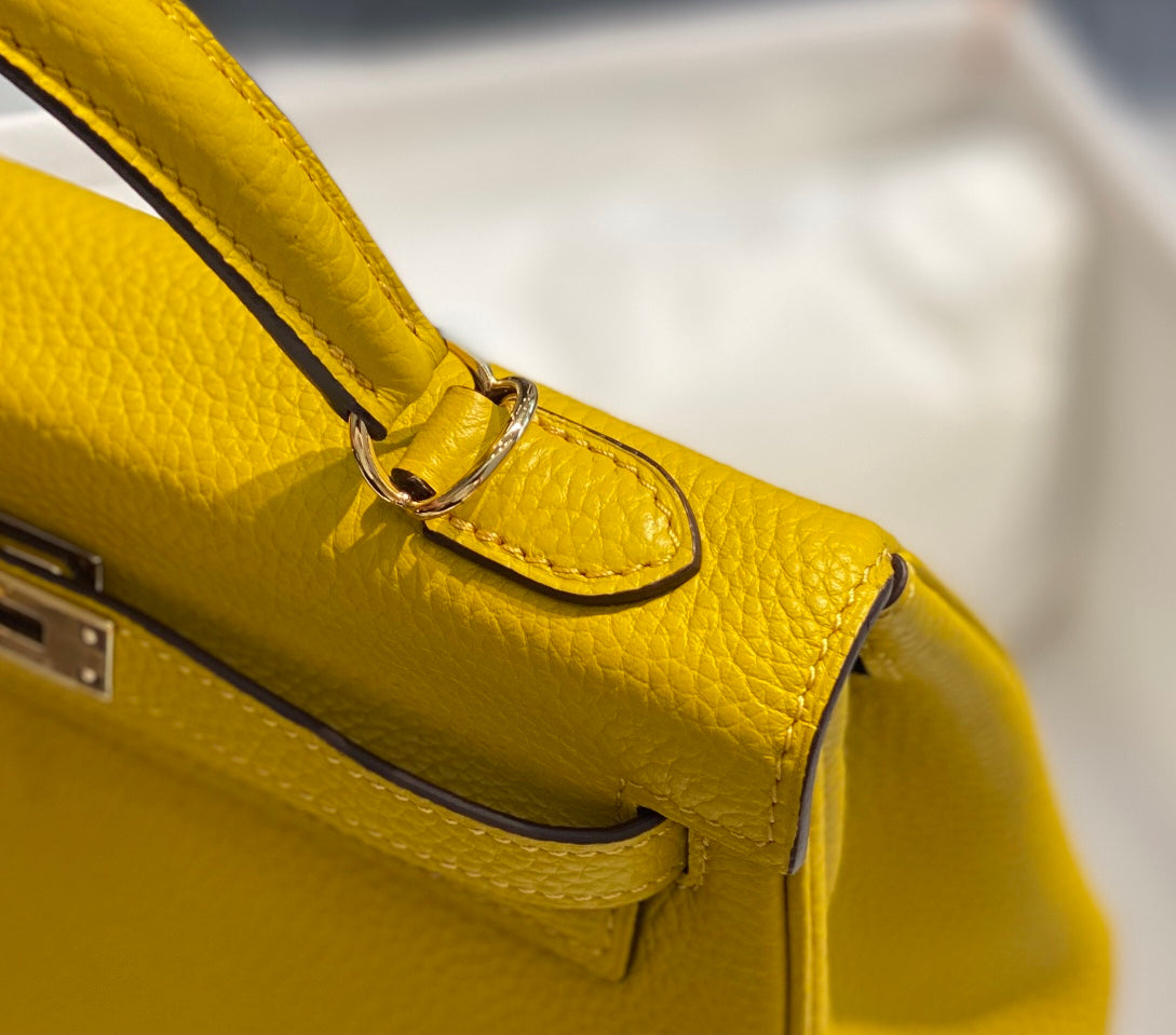 HM KELLY 25CM YELLOW TOGO GOLD HARDWARE