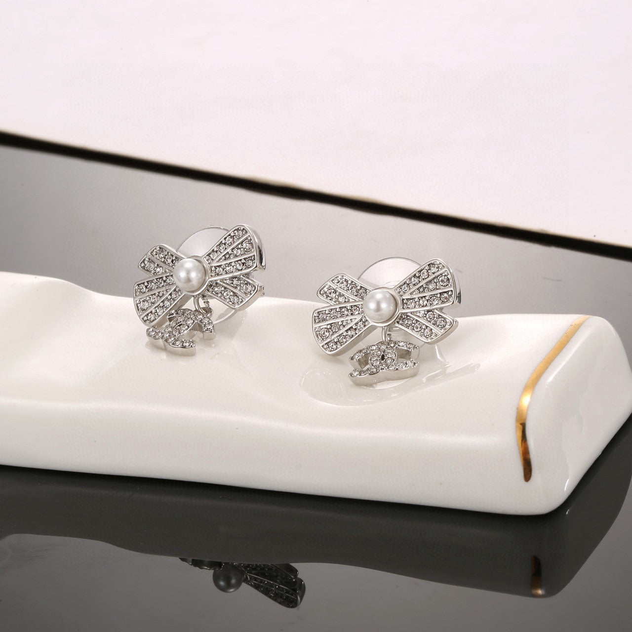 CC Double C Bow Sliver Diamond Pearl Earrings