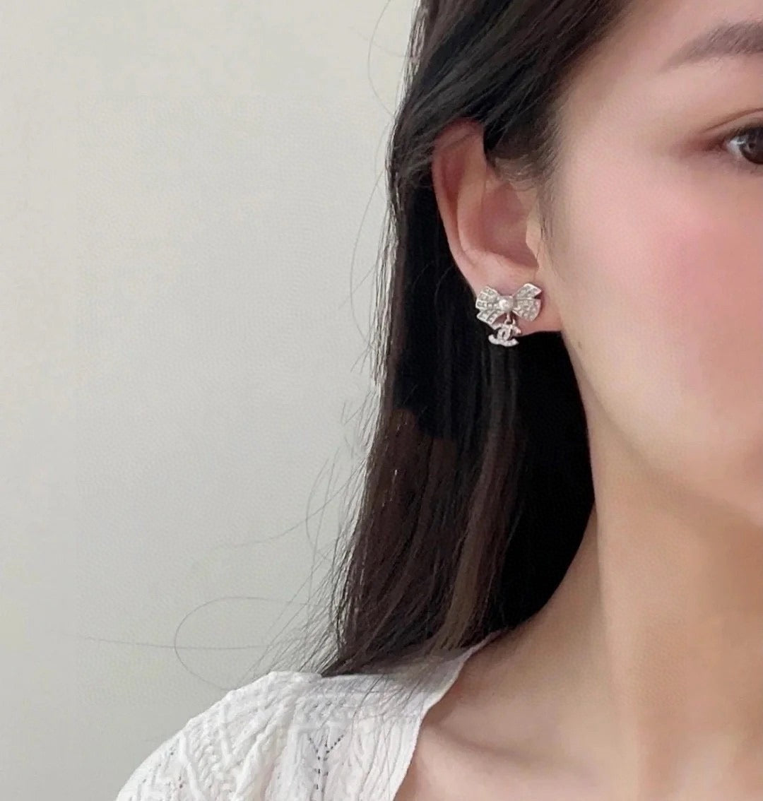 CC Double C Bow Sliver Diamond Pearl Earrings