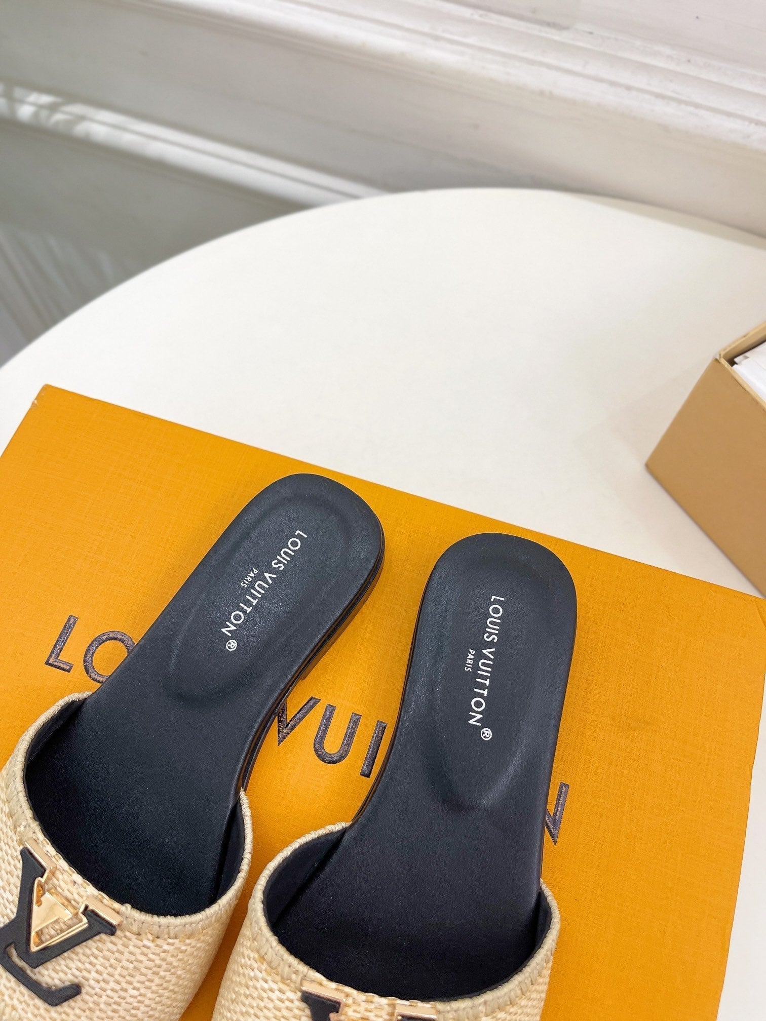lv capri flat mule beige raffia black calfskin